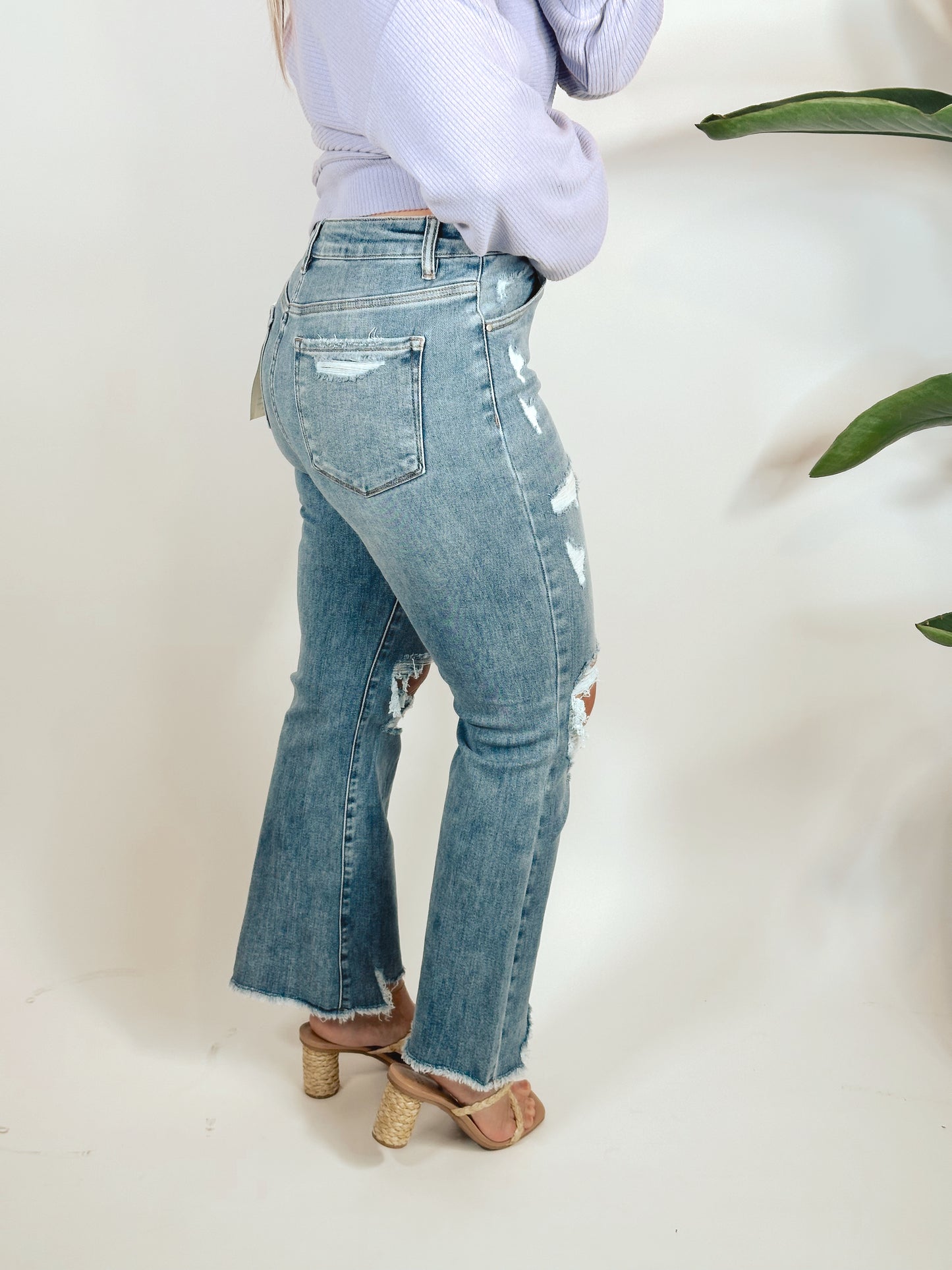 The Olivia Distressed High Rise Ankle Flare Jeans